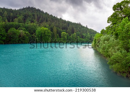 Turquoise water of Lech river in Bavarian Alps, Germany