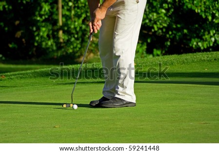 Putting golf ball