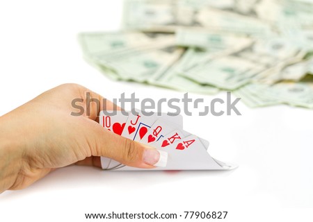 Royal poker in female hand with money background