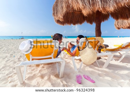 Holidays under parasol at Caribbean Sea