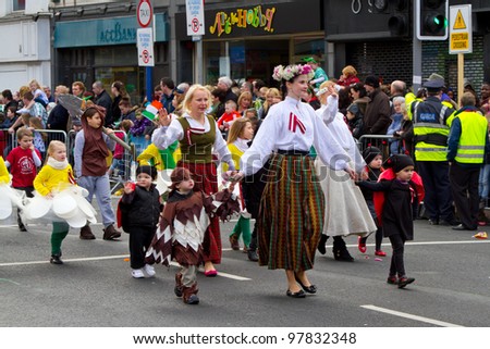 LIMERICK, IRELAND - MARCH 17: Unidentified people participate in a parade for St. Patrick\'s Day. It\'s a traditional Irish holiday celebration. March 17, 2012 in Limerick, Ireland.