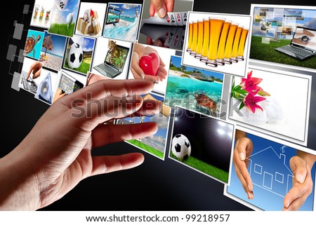 Hand reaching streaming multimedia from internet. All images coming from my gallery.