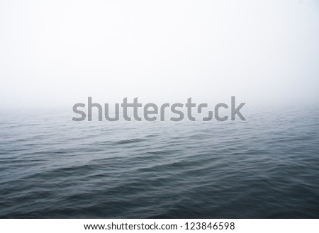 abstract image of a lake with fog.