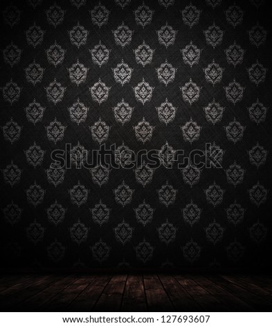 dark interior room with baroque wallpaper.