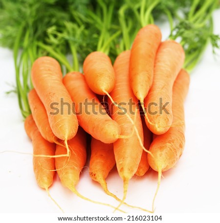 fresh carrots isolated on white.