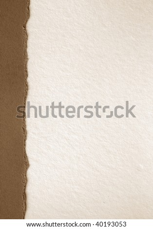white sheet of paper with brown border on the left