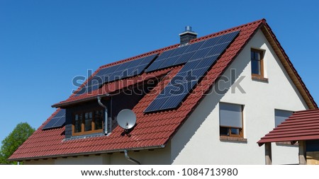 roof with solar panels or photovoltaic plant