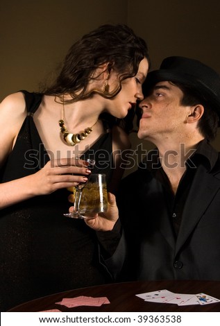 man and woman drink alcohol in retro bar