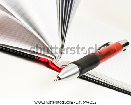 Business - pen and book