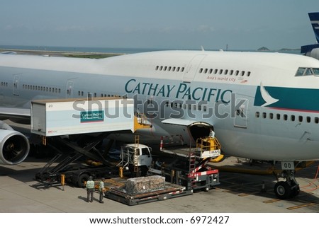 Cathay Pacific Boeing 747-400 being loaded with gourmet food.