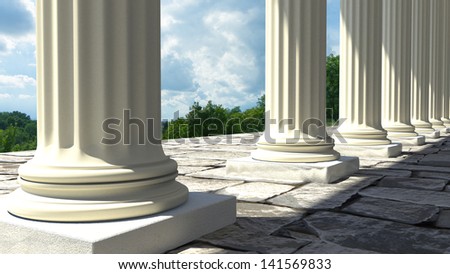 Neoclassical temple columns with panoramic view.