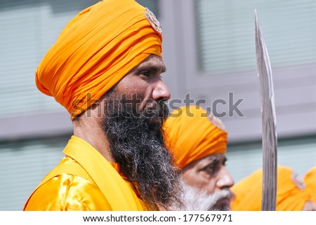 CREMONA - APRIL 13: old man of the Sikh religion in procession through the spring festival Vaisakhi, April 13, 2013 in Cremona, Lombardia, Italy. the Sikh festival takes place every year.