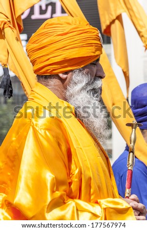 CREMONA - APRIL 13: old man of the Sikh religion in procession through the spring festival Vaisakhi, April 13, 2013 in Cremona, Lombardia, Italy. the Sikh festival takes place every year.