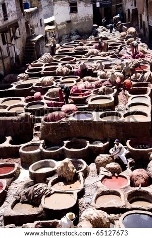 FES, MOROCCO, AFRICA - APRIL 10: men at work in a tannery in Fes on April 10, 2010 in Fes, Morocco, Africa. Tannery is the best resource of work in the city of Morocco