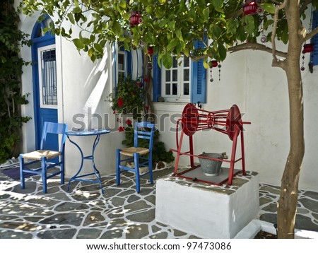 A courtyard with a well in a village house in Greece,