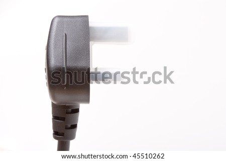 Black molded plastic or rubber power cord isolated against white background with protective cover over electrical contacts.