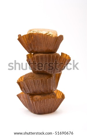 Tower of Champagne Truffles isolated against white background.