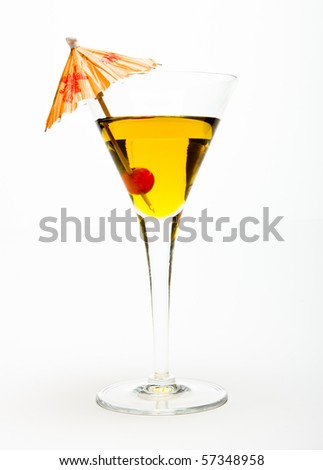 Cherry Cocktail with orange cocktail umbrella isolated against white background.
