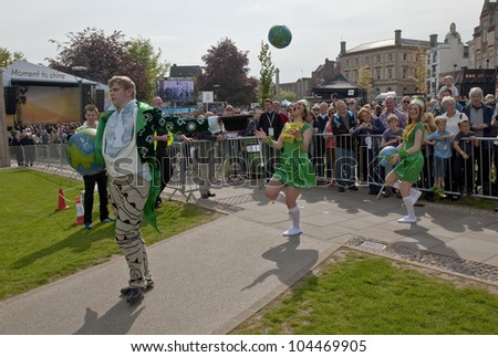 EXETER - MAY 18: Met Office Man, Dan McNeill, walks onto Exeter Cathedral Green as part of the Battle for the Winds Parade on May 18, 2012 in Exeter, UK
