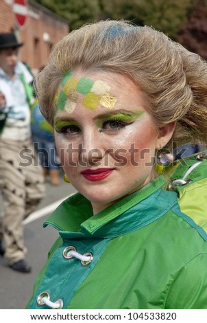 EXETER - MAY 20: The Lady of the Wind, Emma-Rose, prepares to dance through the streets of Exeter as part of the Battle for the Winds Parade on May 20, 2012 in Exeter, UK