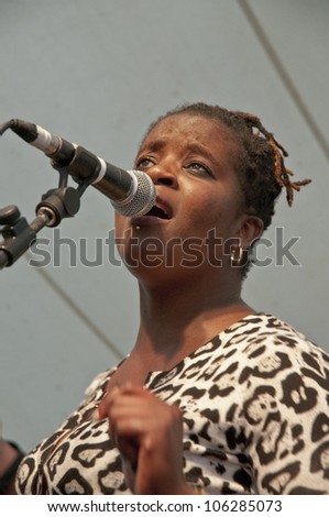 EXETER - JUNE 3: Cassa Afro performing live on the Global Community Stage at the Exeter Respect Festival on June 3, 2012 in Exeter, UK