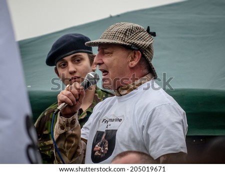 EXETER, UK - NOVEMBER 16: English Defence League member gives a speech during the English Defence League march and rally November 16, 2013 in Exeter, Devon, UK