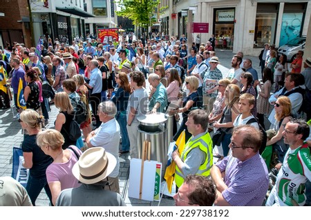 EXETER - JULY 10: The crowd in Princesshay Square during the public sector workers national day of action in Exeter City Centre on July 10,  2014 in Exeter, Devon, UK