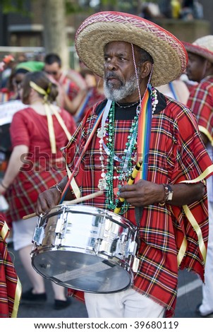 NOTTING HILL, LONDON - AUG 31: Drum leader from the Nostalgia Steel Band at Notting Hill Carnival on August 31 2009 in London, UK.