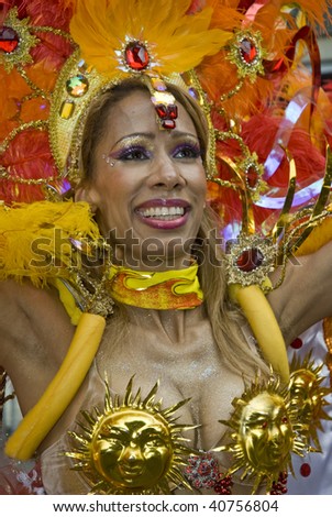 LONDON - AUGUST 31: A dancer from the Paraiso School of Samba float during the Notting Hill Carnival August 31, 2009 in London, England.