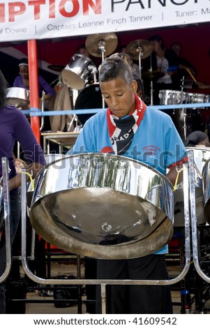 LONDON – AUGUST 29: Steel-drummers from the Croydon Steel Orchestra play steel drum at the Notting Hill Panorama Championships on August 29, 2009 in Hyde Park, London, England.