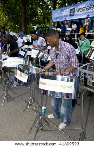 LONDON – AUGUST 29: Steel-drummers from the West Eleven & Mangrove steelband play steel drums at the Notting Hill Panorama Championships on August 29, 2009 in Hyde Park, London, England.