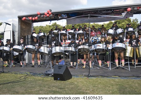 LONDON – AUGUST 29: Steel-drummers from the CIS Band Trust play steel drums at the Notting Hill Panorama Championships on August 29, 2009 in Hyde Park, London, England.