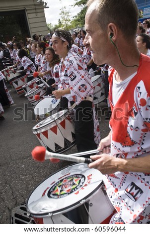 NOTTING HILL, LONDON - AUG 31: Drummers from Batala Banda de Percussao perform on the streets of London at the Notting Hill Carnival street parade on August 30, 2010 in Notting Hill, London, England