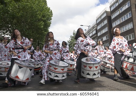 NOTTING HILL, LONDON - AUG 31:  Drummers from Batala Banda de Percussao perform on the streets of London at the Notting Hill Carnival street parade on August 30, 2010 in Notting Hill, London, England