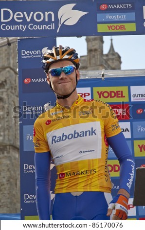 EXETER CITY CENTRE, EXETER - SEPT 15: Yellow jersey holder Lars Boom from the Rabobank Cycling Team before the start of the Tour of Britain on Sept 15, 2011 in Exeter City Centre, Exeter, England.