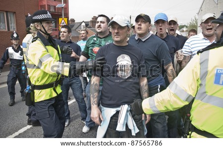 EXETER - APRIL 30:  Devon and Cornwall Police to prevent football violence between Exeter City FC and Plymouth Argyle FC at Exeter\'s St James Park Football ground on April 30, 2011 in Exeter
