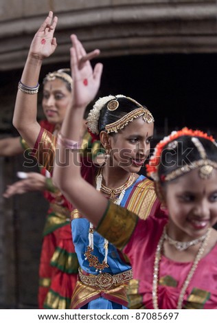 DARTINGTON - MAY 1: Indian dancers enjoying the procession at the opening ceremony of the Tagore festival,  on May 1, 2011 in Dartington