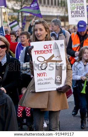 EXETER - NOVEMBER 30: Woman holds a placard saying 