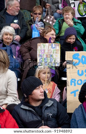 EXETER - NOVEMBER 30: Child holds a sign saying \