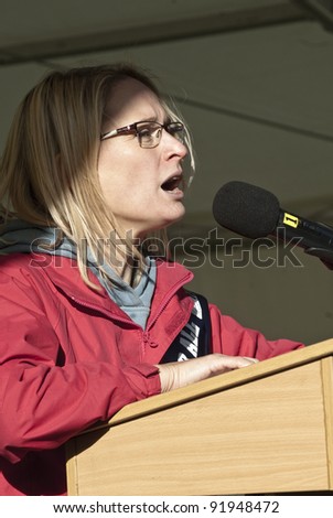 EXETER - NOVEMBER 30: Louise Tomlin from the NUT speaking at St James park for the Exeter N30 rally as part of the national protest on November 30, 2011 in Exeter, UK