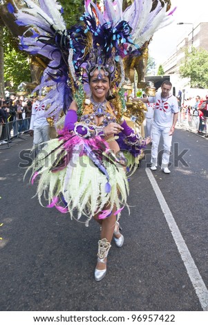 LONDON - AUGUST 30: Dancer from the Paraiso School of Samba float at the Notting Hill Carnival on August 30, 2010 in Notting Hill, London.