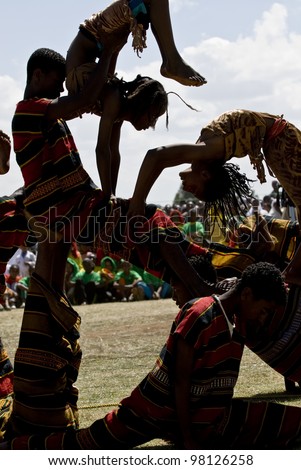FITCHE - JANUARY 13: Gymnasts Performs a Human Tower at the 20th World Aids Day Event on January 13, 2008 in Fitche, Ethiopia