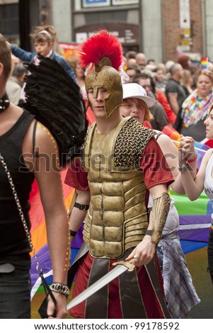EXETER - MARCH 31: Festival goer dressed as a Roman Soldier at the Exeter Pride 2012 Parade in Exeter City centre  on March 31, 2012 in Exeter, UK