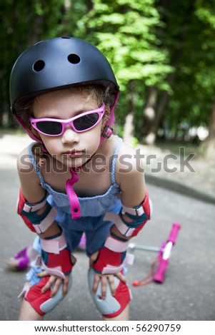 sporty girl with scooter