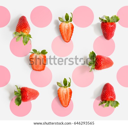 Seamless pattern with strawberry. Tropical abstract background. Strawberry on the light background with pink dots.