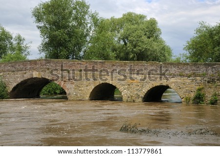 Pershore old bridge over the River Avon in flood, Worcestershire. July 2012