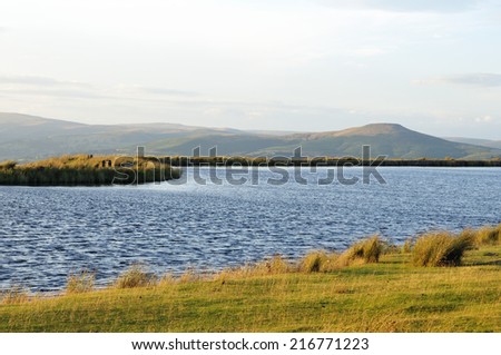Evening Sun on Keepers Pond, Blorenge above Abergavenny Sugar Loaf mountain behind