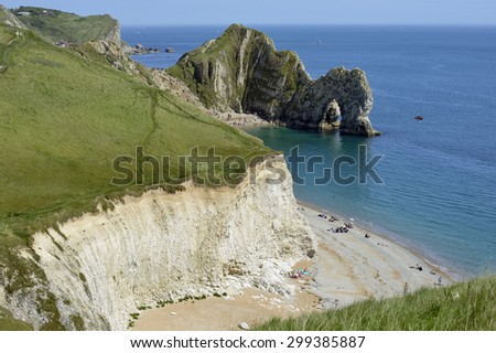 Durdle Door beach & Rock Arch with St Oswald's Bay & Dungy Head behind