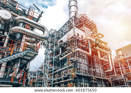 close up Industrial zone,The equipment of oil refining,Close-up of industrial pipelines of an oil-refinery plant,Detail of oil pipeline with valves in large oil refinery, power energy system station.