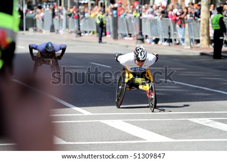 BOSTON - APRIL 19:  Ernst Van Dyk (So.  Africa) leads wheelchair race in Boston Marathon with Krige Schabort behind April 19, 2010 in Boston